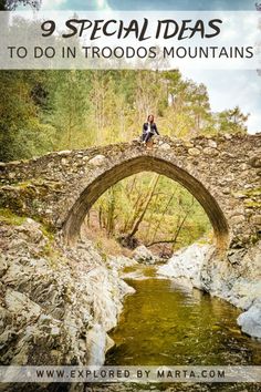 two people sitting on top of a stone bridge over a river with the words 9 special ideas to do in troods mountains