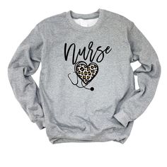 Looking for a cute versatile top to wear? Make sure to grab one of our Graphic Sweatshirts! This soft and comfortable shirt is the perfect top for any outfit. It can be paired with biker shorts, Jeans, or the classic stay at home sweats! This sweatshirt is true-to-size, so be sure to order your regular size! If you are looking for a more oversized look, make sure to size up. Cotton Relaxed Fit Top With Heart Print, Relaxed Fit Cotton Top With Heart Print, Cotton Tops With Heart Print And Relaxed Fit, Cotton Top With Heart Print And Relaxed Fit, Basic Cozy Fit Cotton Tops, Relaxed Fit Crew Neck Top With Heart Print, Cute Long Sleeve Tops For Everyday, Cute Gray Crew Neck Top, Casual Sweatshirt With Heart Graphic For Loungewear