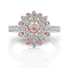 Argyle pink diamond floral ring, inspired by antique European jewels. This modern symmetrical design is a wearable garden to enjoy all year. Argyle pink diamonds, 0.19ct White diamonds, 0.23ct 18k white gold In stock Argyle Diamond Ring, Pink Argyle, Argyle Pink Diamonds, Symmetrical Design, Argyle Diamonds, Pink Diamonds, Daisy Ring, Floral Ring, Pink Daisy