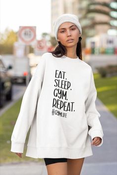 This Eat, Sleep, Gym, Repeat sweater is both soft and lightweight, which makes it perfect for working out or just casually wearing around town. The classic style of this sweater, hoodie or Crop Top makes it versatile enough to pair with any outfit. Order a bigger size to give it an oversized sweatwer look. * Gym Outfits * Gym Fits * Gym Outfits For Women * Hoodie Outfit * Hoodies Aesthetic * Sweater * Sweater Weather * Crop Top * Crop Top Outfits * Crop Tops * Black Crop Top Outfits Crop Top Outfits Fall, Black Crop Top Outfit, Eat Sleep Gym Repeat, Women Hoodie Outfit, Crop Tops Black