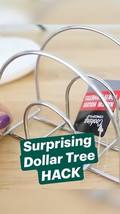 there is a metal rack with two small items in it and the words surprising dollar tree hack