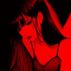 a woman with long hair in red light