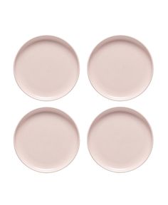 four pink plates sitting on top of each other