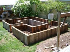 a facebook post with pictures of wooden garden beds