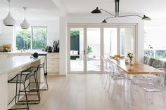 the kitchen is clean and ready to be used as a dining room or living room