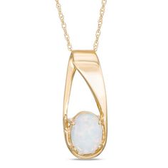 On-trend and oh-so attractive, this intriguing gemstone pendant is a gorgeous fashion find. Crafted in warm 10K gold, this unique design features an 8.0 x 6.0mm oval-shaped lab-created iridescent opal cabochon at the base of an oblong offset slip-bail style. Buffed to a brilliant luster, this dainty birthday-ready or anytime pendant suspends along an 18.0-inch rope chain that secures with a spring-ring clasp. Opal Necklaces, Gold Nugget Ring, Diamond Accent Ring, Opal Pendant Necklace, Peridot Necklace, Necklace Ideas, Peridot Stone, Shiny Things, Opal Pendants