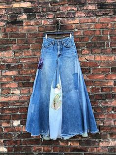 INCREDIBLE patchwork denim skirt from the 1970s made with orange tab LEVIS denim jeans.  Label: LEVIS Measurements: waist: 28" maybe 28.5" hips: 38" length: 42" approx (uneven hem) Condition: some loose patches, a few tears, wear to hem etc as clearly seen. being sold AS FOUND. *ALL SALES CONSIDERED FINAL -vintage is sold in "as-is" / "as-found" condition. we try to mention as best as possible any flaws noted but most of what we sell in this shop is workwear and worn in clothing that shows flaws and wear. Jeans Into Skirt, Refashion Jeans, Creating Clothes, Denim Upcycle, Jeans Label, Upcycling Clothes, Denim Clothes, Patchwork Denim Skirt, Long Jean Skirt