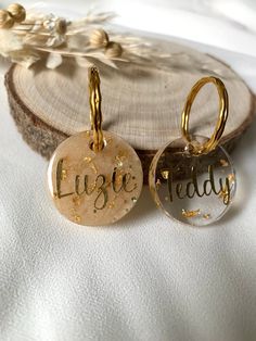 two personalized glass ornament with the word luggie today written on them