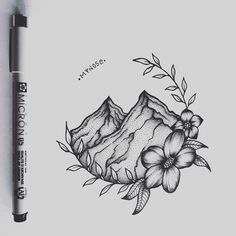 a pencil drawing of mountains and flowers