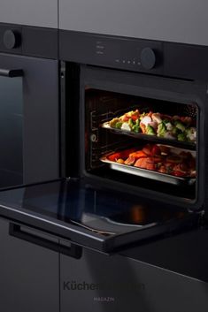 an open oven with food cooking in it's door and on the inside shelf