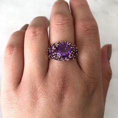 A statement ring is more than just an accessory; it's a reflection of your individuality and flair. Whether you're attending a special event, adding a touch of glamour to your everyday look, or simply treating yourself to something special, our statement rings are sure to make you stand out from the crowd.
.
.
.
#healingcrystals #gemstones #crystallove #amethyst #crystalhealing #crystalsofig #crystalmagick #chakras
#vintagestore #vintageshop #shopvintage #vintagefinds #vintagedesign #vintagelove Formal Amethyst Birthstone Ring With Round Stone, Formal Amethyst Birthstone Ring, Fine Jewelry Purple Birthstone Ring, Fine Jewelry Purple Birthstone Ring With Round Stone, Purple Amethyst Ring With Center Stone, Purple Amethyst Ring With Center Stone And Round Band, Elegant Purple Amethyst Ring With Round Band, Luxury Purple Promise Ring, Purple Amethyst Ring With Accent Stones