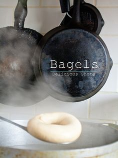 a frying pan with doughnuts in it and the words bagels delicious short