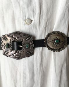 Rare early concho belt with arrow motif, repoussé bump outs, and stamp work. Native American made with ingot silver. Turquoise pieces are untreated and likely from the Cerrillos mine. Circa: 1920/30 Size: OSFM/Adjustable Total length 49 1/4 inches Buckle 2 1/4 x 1 7/8 inches Concho 1 5/8 x 1 3/8 inches Luxury Vintage Concho Bracelets, Luxury Western Concho Bracelet, Luxury Sterling Silver Concho Jewelry, Luxury Unique Concho Jewelry, Vintage Turquoise Belt With Concho, Silver Southwestern Concho Belt, Southwestern Silver Concho Belt, Traditional Concho Belt Buckles For Western-themed Events, Traditional Adjustable Belt Buckle With Antique Detail