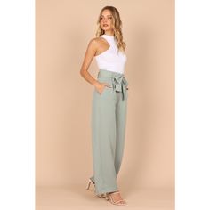 These wide-leg pants are a timeless classic that look as good with a blazer and heels as they do with a casual t-shirt. The high waist and gathered pleated waistband give these trousers an ultra- flattering shape while the functional zip and hook and eye clasp keep your look secure. For added convenience there are belt loops, plus a detachable waist tie to customize your fit. And last but not least, two functional pockets make them practical too! Whether you’re looking for something dressy or ju Chic High Waist Wide Leg Pants With Elastic Waistband, Chic Wide Leg High Waist Pants With Elastic Waistband, Wide Leg Pants For Spring Date Night, Wide Leg Pants For Date Night In Spring, Trendy High Waist Wide Leg Pants For Date Night, Summer Wide Leg Pants For Business Casual, Chic Wide Leg Dress Pants For Business Casual, Wide Leg Pants For Business Casual In Summer, Versatile Bottoms For Date Night In Spring