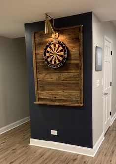 a dart board mounted to the side of a wall