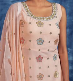 COLOR : Light Peach FABRIC : Top - Georgette, Bottom - Georgette, Dupatta - Georgette WORK : Resham Embroidery, Hand Work, Sequins, Motifs, Tassels, Lace Border OCCASION : Wedding, Reception, Party Wear, Festival READY-TO-WEAR : No STITCHING : Available as semi-stitched fabric, can be stitched using standard size option (+$20). Note: There might be a slight color variation due to lighting and flash used during photoshoot. The bright shade seen is the best closer view of fabric's color. Patiala Salwar Kameez, Embroidered Sharara, Resham Embroidery, Peach Fabric, Churidar Suits, Georgette Dupatta, Salwar Dress, Salwar Kameez Online, Sharara Suit