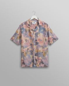 Elevate your wardrobe with our Didcot short sleeve shirt. Constructed from FSC sustainable viscose, it is cut for a relaxed fit updated with a new straight hem.  The Blue/Pink Botanic watercolour pattern is one of our favourites of the season. Relaxed Fit Camp Collar Straight Hem 100% FSC Viscose Watercolour Pattern, Spring Wear, Mens Button Up, Weekend Wear, Floral Stripe, Watercolor Pattern, T Shirt Vest, Recycled Cotton, Shirt Shop