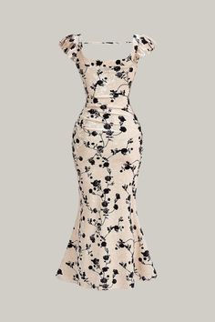 This elegant Fish Tail Dress features a Floral Print and a Square Neckline. The fitted Bodycon style is adorned with an All Over Print and artistic, Ruched details. The Hem is accentuated with a Ruffle design and the Cap Sleeves have a Flounce style. The Regular Fit dress boasts a Long Length and a High Waist for a flattering silhouette. The Hem is shaped in a Mermaid style and the Knitted Fabric has a Medium Stretch. The dress is unlined and does not provide added warmth. 94% Polyester, 6% Elas Fitted V-neck Floral Print Bodycon Dress, V-neck Floral Print Fitted Bodycon Dress, Fitted Floral Print V-neck Evening Dress, Party Bodycon Dress With Floral Print And V-neck, Fish Tail Dress, Party Floral Print V-neck Bodycon Dress, Bandage Jumpsuits, Tail Dress, Bodycon Style