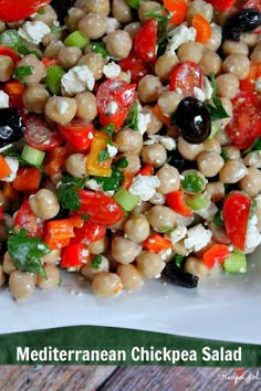 a white plate topped with chickpea salad