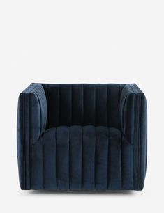 a dark blue velvet chair with pleated arms and legs, on a white background