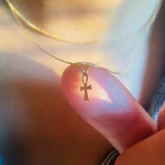 ** Need a Gift Idea? PeaceofStoneHandmade© Unique Jewelry is beautifully Eco- Consciously packaged- ready for gift giving to your someone special! A small Ankh cross on a dainty gold chain.  This tiny cross Pendant Necklace is subtle and elegant.  The Ankh cross is symbolic of life. * 14K Gold Filled * Tiny Ankh Cross * Lobster clasp H O W * IT'S * M A D E Handmade in Virginia, USA with great care, intention and gratitude. 🕊Shauna * Each piece from my jewelry collection is special and handmade Spiritual Charm Necklace With Delicate Chain, Spiritual Engraved Necklaces As Gifts, Spiritual Engraved Necklaces For Gifts, Handmade Spiritual Necklaces For Gifts, Personalized Spiritual Necklaces As Gifts, Spiritual Engraved Necklace For Gift, Hypoallergenic Spiritual Jewelry For Mother's Day, Spiritual Pendant Necklaces As Gifts, Dainty Nickel-free Necklace As Gift