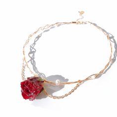 For a sweet way to upgrade your outfit, our Grande Amore Rosebud & Pearl Choker is crafted in London, featuring a beautiful red rose suspended from gold-tone wired pearl choker, with two short gold-tone chains that effortlessly curve around the neckline. Draw attention to the stunning red rose by styling it with a midi dress shaped with a square neckline. Material: dried rosebuds; resin; 18k gold plated brass chain; 18k gold plated copper wire; freshwater pearls;   All the flowers in our jewelle Necklace Gift Packaging, Real Flower Jewellery, Beautiful Red Roses, Real Flower Jewelry, Pearl Choker Necklace, Original Jewelry, Pearl Choker, Color Shapes, Brass Chain