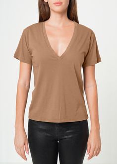 This garment-dyed women's plunge V-neck t-shirt is crafted from lightweight, luxury Supima cotton jersey for an exceptional softness and comfort. Every detail is designed for an effortless fit, wear after wear.    Model is wearing a size S.  Approx. Front Length: 24" Chest: 19 1/4"  Model measurement: Height 5' 10", Bust 32", Waist 24", Hips: 35"   100% Cotton  Made in USA.   Fits true to size. Gifts For New Mums, Supima Cotton, August Birth Stone, Colored Denim, Independent Designers Fashion, Gifts For New Moms, Jacket Sale, Military Green, V Neck Tee