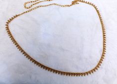 * Beautifully designed gold color belly chain. * can be used with belly dance costumes and saris. * Adjustable from 25 to 41 inches waist. * D.no.1 * D.no.2 *D.no.3 *D.no.4 Gold Waist Chain For Wedding And Festive Occasions, Bohemian Gold Body Chain For Wedding, Elegant Gold Waist Chain For Festive Occasions, Bohemian Gold Waist Beads For Festival, Gold Temple Jewelry Bridal Belt For Festive Occasion, Gold Beads Choker For Festival, Gold Bollywood Bridal Belt For Party, Festive Gold Waist Chain For Parties, Elegant Gold Chain Belt For Festival