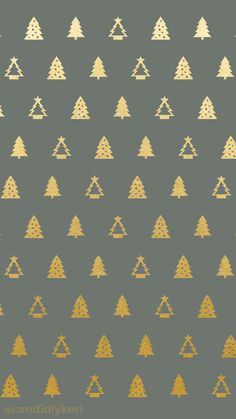 gold christmas trees on grey background