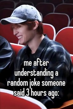 a person sitting in a red chair with a baseball cap on and the caption reads, me after understanding a random joke someone said 3 hours ago