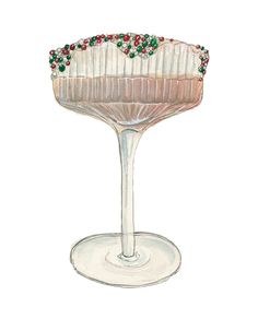 a drawing of a cake on top of a white plate with green and red beads