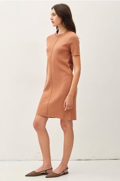 Indulge in the luxurious sophistication of our Hazel Dress. This knit sweater dress boasts exposed raw seams and short sleeves, elevating it from a simple dress to a work of art. Stay effortlessly chic and comfortable with this unique and stylish piece. Elegant Short Sleeve Ribbed Mini Dress, Elegant Ribbed Mini Dress With Short Sleeves, Chic Knit Short Sleeve Dresses, Elegant Short Sleeve Knit Dress, Modern Fitted Mini Dress With Short Sleeves, Chic Midi Dress With Crew Neck For Work, Elegant Mini Length Dresses For Layering, Fitted Ribbed Dresses For Layering, Ribbed Knit Short Sleeve Dresses