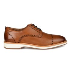 A timeless classic every man needs, the Fremont. This genuine leather derby features an adjustable lace-up closure and an 8 mm Comfort Foam™ footbed that will keep you on your feet with ease. Handsome brogue details frame the look, and an EVA outsole grounds this design by Thomas & Vine. Genuine leather upper, Lace-up closure for a custom and secure fit, Approx. 1 inch heel, Classic round toe, Comfort Foam™ padded footbed for added comfort, Lightweight and durable EVA ousole, Thomas & Vine brand Vine Shoes, Thomas Vines, Derby Dress, Famous Footwear, Shoe Carnival, Leather Chelsea Boots, Round Toe Heels, Every Man, Mens Oxfords