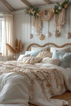 a large bed sitting in a bedroom next to a wall with shells hanging on it