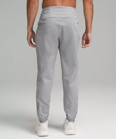 Surge Jogger | Men's Joggers | lululemon Casual Go-dry Bottoms For Running Errands, Lululemon Athletic Fit Functional Bottoms, Lululemon Sportswear Bottoms For Running, Casual Lululemon Sports Pants, Lululemon Casual Sports Pants, Casual Activewear With Ribbed Waistband For Running, Casual Activewear For Running With Ribbed Waistband, Lululemon Athletic Fit Sporty Bottoms, Lululemon Functional Workout Joggers