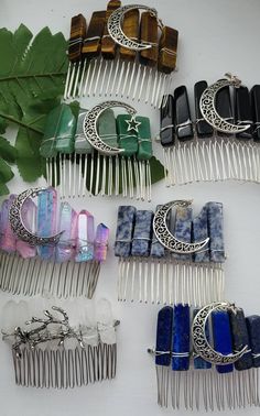 Crystal hair combs available.in different  materials. Natural crystals perfect for any occasion or as a gift to someone special.  Available Materials  Black Obsidian  Tigers eye  Green Aventurine  Lapis Lazuli  Clear quartz  Aura Clear quartz  Sodalite  Please be advised that these are natural stones and may come with lots of natural imperfections. This makes the moat perfect gift for anyone special. By purchasing from 6ix Wicks Candle & Crystal you are aggreeing to all my shop's policies. Notes Candle Crystal, Eye Green, Crystal Hair Accessories, Crystal Hair Comb, Crystal Hair Pins, Hair Combs, Black Obsidian, Crystal Hair, Canada Post