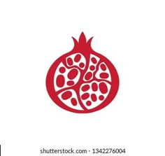 the pomegranate is cut in half and placed on top of each other