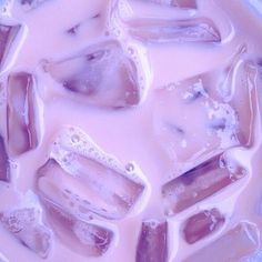 ice cubes with various types of shoes on them and water droplets all over them