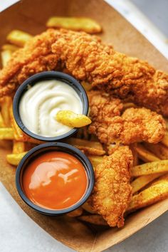 fried chicken and french fries with dipping sauce