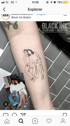 a tattoo on the arm of a woman with two women sitting next to each other