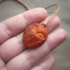 Excited to share this item from my #etsy shop: Hand carved avocado stone necklace. Owls are not what they seem. Owl necklace. Bird necklace. Natural jewelry Hand Painted Nature-inspired Pendant Necklace, Nature-inspired Pendant Necklace With Hand Painted Details, Nature-inspired Hand Painted Pendant Necklace, Brown Carved Round Pendant Necklace, Hand-cast Pendant Necklace With Nature-inspired Style, Artisan Carved Necklaces As A Gift, Hand Cast Nature-inspired Pendant Necklace, Nature-inspired Hand Cast Necklaces As Gift, Nature-inspired Hand Cast Pendant Necklace