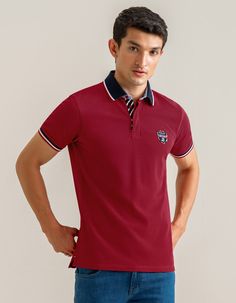 This red fashion polo is designed for men who appreciate both comfort and style. The luxuriously soft cotton feels feather soft on your skin, while the classic fit provides a flattering figure. The unique printed placket adds a touch of modern edge, making it the best choice for the style-conscious individual. 100% Cotton Regular fit Soft fabric finish Printed hidden button placket Ribbed cuffs with contrast tipping Woven badge Anti-pilling fabric Casual Red Polo Shirt With Collared Neckline, Fitted Red Polo Shirt With Polo Collar, Fitted Red Polo Shirt, Red Fitted Polo Shirt, Red Cotton Polo Shirt, Classic Red Tops With Collared Neckline, Red Cotton Tops With Casual Collar, Red Cotton Polo Shirt For Summer, Classic Red Top With Casual Collar