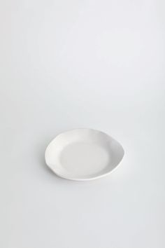 a white plate sitting on top of a table