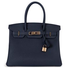 100% authentic Hermès Birkin 30 bag in Bleu Nuit (midnight blue) Veau Togo leather with rose-gold plated hardware. Lined in Chèvre (goat skin) with an open pocket against the front and a zipper pocket against the back. Has been carried once or twice with very faint scratches on the hardware. Comes with full set. Measurements Model H044577CD 2Z Height 25cm (9.8in) Width 30cm (11.7in) Depth 10cm (3.9in) Drop of the Handle 9cm (3.5in) Hardware Rose-Gold All our listings include only the listed item unless otherwise specified in the description above French Tote Bag, Fringe Tote Bag, Dream Bag, Birkin 30, Hermes Birkin 30, Togo Leather, Kelly Bag, Jane Birkin, Anya Hindmarch