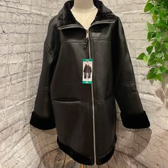 Rebecca Minkoff Ladies' Faux Leather Car Coat Size: Xl Color: Black Faux Fur Lined Full Zip Two Front Pockets Studded Pull Tab Relaxed Fit Made In China Content: Shell: 100% Polyurethane Lining: 100% Polyester Approximately 770 Gsm Heavyweight Care Instructions: Dry Clean By Leather Professional Only Oversized Black Outerwear With Faux Fur Trim, Car Coat, Black Faux Fur, Pull Tab, Rebecca Minkoff, Faux Fur, Care Instructions, Jackets & Coats, Faux Leather