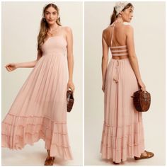 Blush Pink Jade Forever Yours Tiered Woven Bohemian Maxi Summer Dress - Feminine Woven Maxi Dress - Halter Strap Ribbon Tie On Neckline - Smocking On The Front Bust - 3 Bold Elastic Band Strap On Center Back For Easy Wear With Self Ribbon Tie On Waist Band - Ruching On Bottom Skirt - Tiered Layer On Bottom Skirt With Ribbon Detail - Finished With Clean Hem - Lining Inside - Model Is 5' 10.5" 32.5-24-37 And Wearing A Size Small Material: 100% Rayon Our Boutique Is Filled With A Curated Collection Feminine Boho Maxi Dress For Summer, Feminine Pink Boho Dress For Summer, Feminine Flowy Boho Dress For Garden Party, Bohemian Peach Dress With Ruffles, Peach Bohemian Sleeveless Maxi Dress, Flowy Peach Maxi Dress For Vacation, Peach Sleeveless Bohemian Maxi Dress, Bohemian Peach Dress For Vacation, Peach Bohemian Vacation Dress