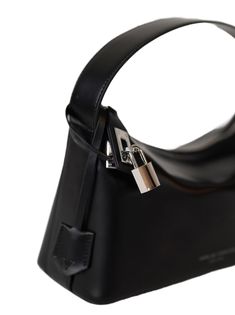 For the minimalist dresser, this VERAFIED hobo bag will be right up your alley. In match-all black, this bag is a timeless, tried-and-true staple that features a sophisticated, semi-structured silhouette. This bag is made of Calfskin leather, which is particularly valuable because of its softness and fine grain, as well as durability. This bag is stylish and functional at once. Carry it as a shoulder bag or a clutch with the adjustable twister shoulder strap. 100% Cow leather; lining: 60% polyur Elegant Shoulder Bag With Lock For Everyday Use, Modern Evening Shoulder Bag With Lock, Formal Hobo Bag With Gunmetal Hardware, Luxury Formal Hobo Bag With Gunmetal Hardware, Elegant Hobo Bag With Gunmetal Hardware For Evening, Formal Hobo Shoulder Bag With Gunmetal Hardware, Luxury Hobo Bag With Gunmetal Hardware For Formal Events, Chic Evening Shoulder Bag With Lock, Modern Black Shoulder Bag With Lock