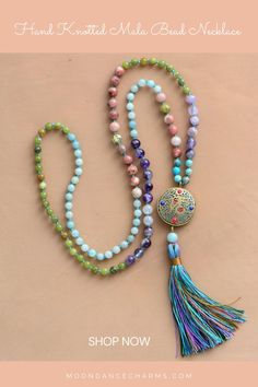 Hand Knotted Mala Bead Necklace. Express yourself more with this colorful Mala Necklace that will support your intentions and will gently remind you of them throughout your day. Check out our mala necklace collection and Get inspired by the meaning of the mala beads. Malas and meditation go hand in hand. They help you to enhance your spiritual practices. We offer a great variety of prayer beads, meditation tools, Japa mala 108 beads, and 27. Check our website to see more> Bohemian Festival Mala With 108 Beads, Bohemian Mala With 108 Beads For Festivals, 108 Beads Jewelry For Healing And Festivals, Healing 108 Beads Jewelry For Festivals, Adjustable Multicolor Crystal Necklace With 8mm Beads, Spiritual 108 Beads Mala For Yoga, Spiritual Mala With 108 Beads For Festival, Holistic Necklaces With 8mm Beads For Festivals, Bohemian Crystal Necklaces With 8mm Beads