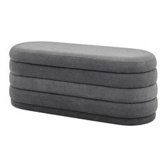 three grey pillows stacked on top of each other