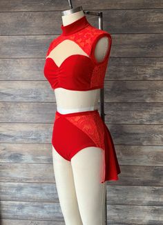 a mannequin wearing a red and white bikinisuit with an attached bra top